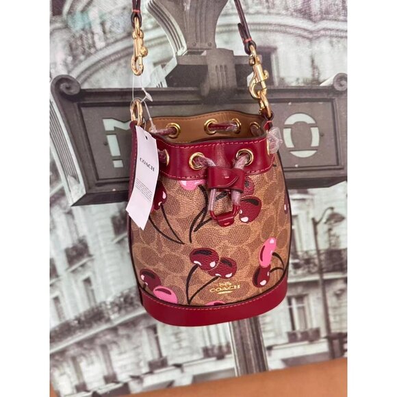Coach CY738 Mini Bucket Bag In Signature Canvas With Cherry Print IN TAN MULT! - Picture 1 of 6